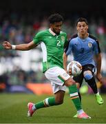 4 May 2017; Cyrus Christie of Republic of Ireland in action against Federico Ricca of Uruguay during the international friendly match between Republic of Ireland and Uruguay at the Aviva Stadium in Dublin. Photo by Ramsey Cardy/Sportsfile