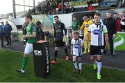 2 June 2017; Team captains Alan Bennett of Cork City and Dane Massey of Dundalk lead their teams out ahead of the SSE Airtricity League Premier Division match between Dundalk and Cork City at Oriel Park in Dundalk, Co. Louth. Photo by Ramsey Cardy/Sportsfile