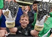 7 June 2017; Noah Pender, age 6, from Ashbourne, Co Meath, shows off a pair of goalkeeping gloves presented to him from Republic of Ireland goalkeeper Darren Randolph after squad training at the Aviva Stadium in Dublin. Photo by David Maher/Sportsfile