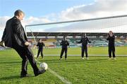 16 January 2012; The College Football Association of Ireland (CFAI) has announced that it will attempt to break the Guinness World Record for consecutive penalties, in Tallaght Stadium on February 15th 2012. At the announcement is FAI Chief Executive John Delaney taking a penalty kick against students from St. Anne’s National School, Fettercairn, Tallaght, from left to right, Angel Cruise, Jacob Ebenezer, Toby Abesanya and Rachel Kedney. Tallaght Stadium, Tallaght, Dublin. Picture credit: David Maher / SPORTSFILE