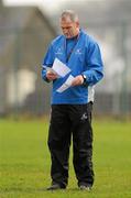 18 January 2012; Connacht head coach Eric Elwood looks at his notes during squad training ahead of their Heineken Cup, Pool 6, Round 6, game against Harlequins on Friday. Connacht Rugby Squad Training, Sportsground, Galway. Picture credit: Diarmuid Greene / SPORTSFILE