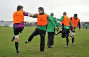 18 January 2012; Connacht's Mike McCarthy, left, and Tiernan O'Halloran warm up during squad training ahead of their Heineken Cup, Pool 6, Round 6, game against Harlequins on Friday. Connacht Rugby Squad Training, Sportsground, Galway. Picture credit: Diarmuid Greene / SPORTSFILE