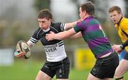 18 January 2012; Robbie Mullen, Newbridge College, is tackled by Louise Cannon, Sandford Park. Powerade Leinster Schools Vinnie Murray Cup, 2nd Round, Newbridge College v Sandford Park, Garda RFC, Westmanstown, Co. Dublin. Picture credit: Brian Lawless / SPORTSFILE