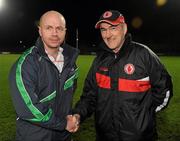 18 January 2012; Fermanagh manager Peter Canavan, left, and Tyrone manager Mickey Harte shake hands before the game. Power NI Dr. McKenna Cup, Section A, Tyrone v Fermanagh, Healy Park, Omagh, Co. Tyrone. Picture credit: Oliver McVeigh / SPORTSFILE