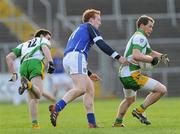 15 January 2012; Anthony Thompson, and Martin Reilly, left, Donegal, in action against Declan McKiernan, Cavan. Power NI Dr. McKenna Cup - Section C, Cavan v Donegal, Kingspan Breffni Park, Cavan. Picture credit: Brian Lawless / SPORTSFILE