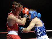 20 January 2012; Philip Sutcliffe, right, Crumlin, in action against Tyrone McKenna, Oliver Plunkett, during their 64kg bout. 2012 National Elite Boxing Championships, National Stadium, Dublin. Photo by Sportsfile