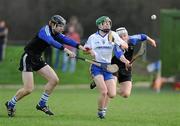 18 January 2012; Stephen Cahill, Thurles CBS, in action against Jack Peters, left, and Eddie Hynes, Nenagh CBS. Dr Harty Cup Quarter-Final, Nenagh CBS v Thurles CBS, Dolla, Co. Tipperary. Picture credit: Matt Browne / SPORTSFILE
