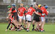 21 January 2012; Players from both teams tussle off the ball during the game. Pre-season Hurling Challenge, Cork v UCC, Mardyke Arena, Cork. Picture credit: Diarmuid Greene / SPORTSFILE