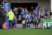 21 January 2012; Leinster captain Leo Cullen with the team mascots before the game. Heineken Cup, Pool 3, Round 6, Leinster v Montpellier, RDS, Ballsbridge, Dublin. Picture credit: Matt Browne / SPORTSFILE