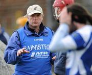 21 January 2012; Laois manager Teddy McCarthy speaks to team members before the game. Bord na Mona Walsh Cup, Laois v Dublin Institute of Technology, Rathdowney-Errill GAA Club, Kelly Daly Park, Rathdowney, Co. Laois. Picture credit: Ray McManus / SPORTSFILE
