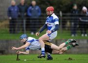 21 January 2012; Pat Kenny, Dublin Institute of Technology, in action against Conor Dunne, Laois. Bord na Mona Walsh Cup, Laois v Dublin Institute of Technology, Rathdowney-Errill GAA Club, Kelly Daly Park,  Rathdowney, Co. Laois. Picture credit: Ray McManus / SPORTSFILE