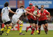 21 January 2012; Paddy Wallace, Ulster, is tackled by Nathan Hines, Clermont Auvergne. Heineken Cup, Pool 4, Round 6, Clermont Auvergne v Ulster, Stade Marcel Michelin, Clermont-Ferrand, France. Picture credit: Oliver McVeigh / SPORTSFILE
