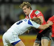 21 January 2012; Andrew Trimble, Ulster, is tackled by Aurélien Rougerie, Clermont Auvergne. Heineken Cup, Pool 4, Round 6, Clermont Auvergne v Ulster, Stade Marcel Michelin, Clermont-Ferrand, France. Picture credit: Oliver McVeigh / SPORTSFILE