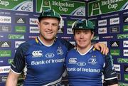 21 January 2012; Leinster's Jamie Heaslip, left, and Eoin Reddan who were presented with their Heineken European Cup Rugby 50th Caps following the game. Heineken Cup, Pool 3, Round 6, Leinster v Montpellier, RDS, Ballsbridge, Dublin. Picture credit: Stephen McCarthy / SPORTSFILE