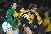 21 January 2012; Eoin Culligan, Dublin City University, in action against Stephen Bray, Meath. Bord na Mona O'Byrne Cup, Semi-Final, Meath v Dublin City University, Pairc Tailteann, Navan, Co. Meath. Photo by Sportsfile