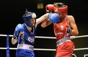21 January 2012; Ceire Smith, Cavan, left, exchanges punches with Jade Corcoran, Crumlin, during their 51kg female bout. 2012 National Elite Boxing Championships, Preliminaries, National Stadium, Dublin. Picture credit: Stephen McCarthy / SPORTSFILE