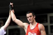 21 January 2012; Darren O'Neill, Paulstown, is announced victorious over Stephen O'Reilly, Twintowns, following their 75kg bout. 2012 National Elite Boxing Championships, Preliminaries, National Stadium, Dublin. Picture credit: Stephen McCarthy / SPORTSFILE