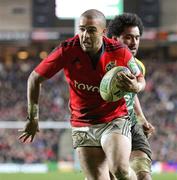 21 January 2012; Simon Zebo, Munster, celebrates as he crosses the line to score his third, and Munster's 5th, try of the game. Heineken Cup, Pool 1 Round 6, Northampton Saints v Munster, Franklin's Gardens, Northampton, England. Picture credit: Matt Impey / SPORTSFILE