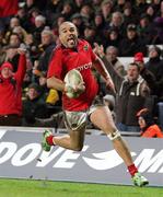 21 January 2012; Simon Zebo, Munster, on his way to scoring his side's third try. Heineken Cup, Pool 1 Round 6, Northampton Saints v Munster, Franklin's Gardens, Northampton, England. Picture credit: Matt Impey / SPORTSFILE