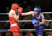21 January 2012; Eamon Wash, St Annes, right, exchanges punches with Patrick O'Shea, Sunnyside, during their 81kg bout. 2012 National Elite Boxing Championships, Preliminaries, National Stadium, Dublin. Picture credit: Stephen McCarthy / SPORTSFILE