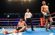 10 June 2017; Jacob Lucas, left, lies on the ground as his opponent Padraig McCrory knocked him down during their Light-Heavyweight bout at the Boxing in Belfast in the SSE Arena, Belfast. Photo by David Fitzgerald/Sportsfile