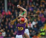 10 June 2017; Colin Fennelly of Kilkenny wins possession ahead of Willie Devereux of Wexford in the move that led to a penalty for kilkenny in the first minute during the Leinster GAA Hurling Senior Championship Semi-Final match between Wexford and Kilkenny at Wexford Park in Wexford. Photo by Ray McManus/Sportsfile