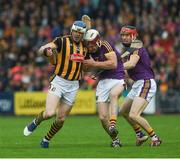 10 June 2017; T.J. Reid of Kilkenny in action against James Breen and Diarmuid O’Keeffe, right, of Wexford during the Leinster GAA Hurling Senior Championship Semi-Final match between Wexford and Kilkenny at Wexford Park in Wexford. Photo by Ray McManus/Sportsfile