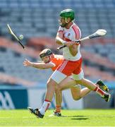 10 June 2017; Ruairí Convery of Derry scores a point despite the flying hurley of Ciarán Clifford of Armagh during the Nicky Rackard Cup Final match between Armagh and Derry at Croke Park in Dublin. Photo by Piaras Ó Mídheach/Sportsfile