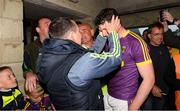 10 June 2017; A young boy looks on as the suspended Wexford manager Davy Fitzgerald celebrates with Liam Ryan of Wexford in the tunnel after the Leinster GAA Hurling Senior Championship Semi-Final match between Wexford and Kilkenny at Wexford Park in Wexford. Photo by Ray McManus/Sportsfile