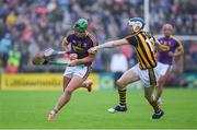 10 June 2017; Conor McDonald of Wexford in action against T.J. Reid of Kilkenny during the Leinster GAA Hurling Senior Championship Semi-Final match between Wexford and Kilkenny at Wexford Park in Wexford. Photo by Ray McManus/Sportsfile