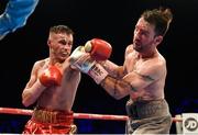 10 June 2017; Ryan Burnett, left, exchanges punches with Lee Haskins during their IBF World Bantamweight Championship bout at the Boxing in Belfast in the SSE Arena, Belfast. Photo by David Fitzgerald/Sportsfile