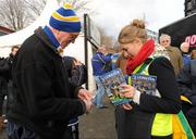 21 January 2012; A general view of a Leinster supporter buying his match programme before the game. Heineken Cup, Pool 3, Round 6, Leinster v Montpellier, RDS, Ballsbridge, Dublin. Picture credit: Barry Cregg / SPORTSFILE