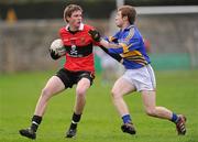 22 January 2012; Brian Coughlan, UCC, in action against Brian Fox, Tipperary. McGrath Cup Football, Semi-Final, Tipperary v University College Cork, Clonmel Sportsfield, Clonmel, Co. Tipperary. Picture credit: Stephen McCarthy / SPORTSFILE