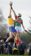 22 January 2012; Jason Gibbons, Mayo, in action against Michael Finneran, Roscommon. FBD Insurance League, Section B, Round 3, Roscommon v Mayo, Ballinlough GAA Grounds, Ballinlough, Co. Roscommon. Picture credit: Pat Murphy / SPORTSFILE