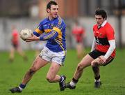 22 January 2012; Paddy Codd, Tipperary, in action against Gavin Ryan, UCC. McGrath Cup Football, Semi-Final, Tipperary v University College Cork, Clonmel Sportsfield, Clonmel, Co. Tipperary. Picture credit: Stephen McCarthy / SPORTSFILE