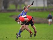 22 January 2012; Adrian Greaney, UCC, in action against Thomas Ryan, Tipperary. McGrath Cup Football, Semi-Final, Tipperary v University College Cork, Clonmel Sportsfield, Clonmel, Co. Tipperary. Picture credit: Stephen McCarthy / SPORTSFILE