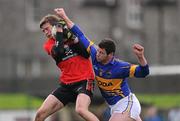 22 January 2012; Brian Coughlan, UCC, in action against Thomas Ryan, Tipperary. McGrath Cup Football, Semi-Final, Tipperary v University College Cork, Clonmel Sportsfield, Clonmel, Co. Tipperary. Picture credit: Stephen McCarthy / SPORTSFILE