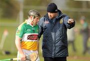 22 January 2012; The Offaly manager Ollie baker talks to Sean Ryan before the game. Bord na Mona Walsh Cup, Westmeath v Offaly, Coralstown Kinnegad GAA Club, Kinnegad, Co. Westmeath. Picture credit: Ray McManus / SPORTSFILE