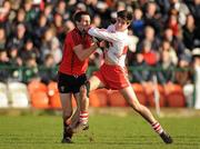22 January 2012; Chrissy McKaigue, Derry, in action against Dan Gordon, Down. Power NI Dr. McKenna Cup, Semi-Final, Derry v Down, Morgan Athletic Grounds, Armagh. Picture credit: Oliver McVeigh / SPORTSFILE