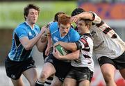 22 January 2012; Cathal Marsh supported by Barry Daly, Leinster A, is tackled by Gavin Dacey and Patrick Palmer, right, Pontypridd. British & Irish Cup Quarter-Final, Leinster A v Pontypridd, Donnybrook Stadium, Donnybrook, Dublin. Picture credit: Brian Lawless / SPORTSFILE