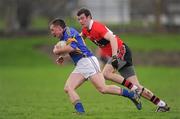 22 January 2012; Peter Acheson, Tipperary, in action against Padraig Lucey, UCC. McGrath Cup Football Semi-Final, Tipperary v University College Cork, Clonmel Sportsfield, Clonmel, Co. Tipperary. Picture credit: Stephen McCarthy / SPORTSFILE