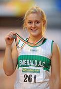 22 January 2012; Sarah Lavin, Emerald AC, Co. Limerick, with her gold medal after she won the Junior Women's 60m Hurdles at the Woodie’s DIY Junior Indoor Track & Field Championships of Ireland. Nenagh, Co. Tipperary. Picture credit: Matt Browne / SPORTSFILE