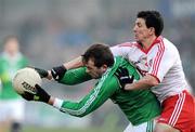 22 January 2012; Sean Quigley, Fermanagh, in action against PJ Quinn, Tyrone. Power NI Dr. McKenna Cup, Semi-Final, Tyrone v Fermanagh, Morgan Athletic Grounds, Armagh. Picture credit: Oliver McVeigh / SPORTSFILE