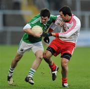22 January 2012; Kane Connor, Fermanagh, in action against Justin McMahon, Tyrone. Power NI Dr. McKenna Cup, Semi-Final, Tyrone v Fermanagh, Morgan Athletic Grounds, Armagh. Picture credit: Oliver McVeigh / SPORTSFILE