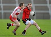 22 January 2012; Brendan Coulter, Down, in action against Brian McCallion, Derry. Power NI Dr. McKenna Cup, Semi-Final, Derry v Down, Morgan Athletic Grounds, Armagh. Picture credit: Oliver McVeigh / SPORTSFILE
