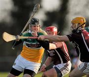 22 January 2012; Shane Dooley, Offaly, in action against Conor Jordan, right, and Philip Gilsenan, Westmeath. Bord na Mona Walsh Cup, Westmeath v Offaly, Coralstown Kinnegad GAA Club, Kinnegad, Co. Westmeath. Picture credit: Ray McManus / SPORTSFILE