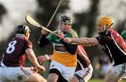 22 January 2012; Shane Dooley, Offaly, in action against Conor Jordan and Eoin Price, 8, Westmeath. Bord na Mona Walsh Cup, Westmeath v Offaly, Coralstown Kinnegad GAA Club, Kinnegad, Co. Westmeath. Picture credit: Ray McManus / SPORTSFILE
