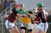 22 January 2012; Shane Dooley, Offaly, in action against Philip Gilsenan, left, and Andrew Mitchell, Westmeath. Bord na Mona Walsh Cup, Westmeath v Offaly, Coralstown Kinnegad GAA Club, Kinnegad, Co. Westmeath. Picture credit: Ray McManus / SPORTSFILE