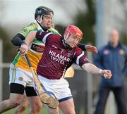 22 January 2012; Philip Gilsenan, Westmeath, in action against Shane Dooley, Offaly. Bord na Mona Walsh Cup, Westmeath v Offaly, Coralstown Kinnegad GAA Club, Kinnegad, Co. Westmeath. Picture credit: Ray McManus / SPORTSFILE