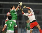 22 January 2012; James Sherry, Fermanagh, in action against Joe McMahon, Tyrone. Power NI Dr. McKenna Cup, Semi-Final, Tyrone v Fermanagh, Morgan Athletic Grounds, Armagh. Picture credit: Oliver McVeigh / SPORTSFILE